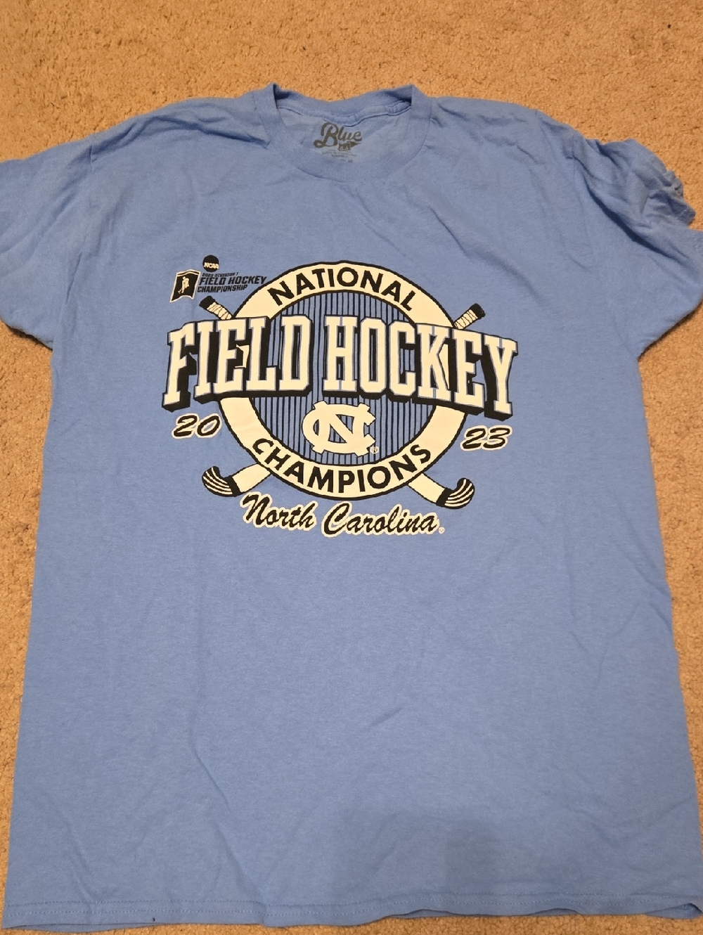 Blue 84 North Carolina Light Blue Field Hockey Champions Tee